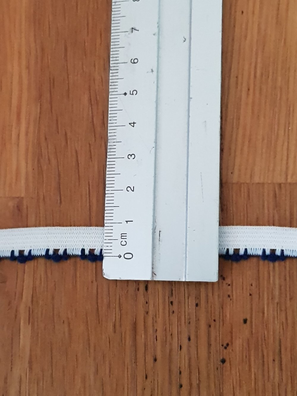 Meterware Elastisches Gummiband wei&szlig; Phantasie 9 mm.