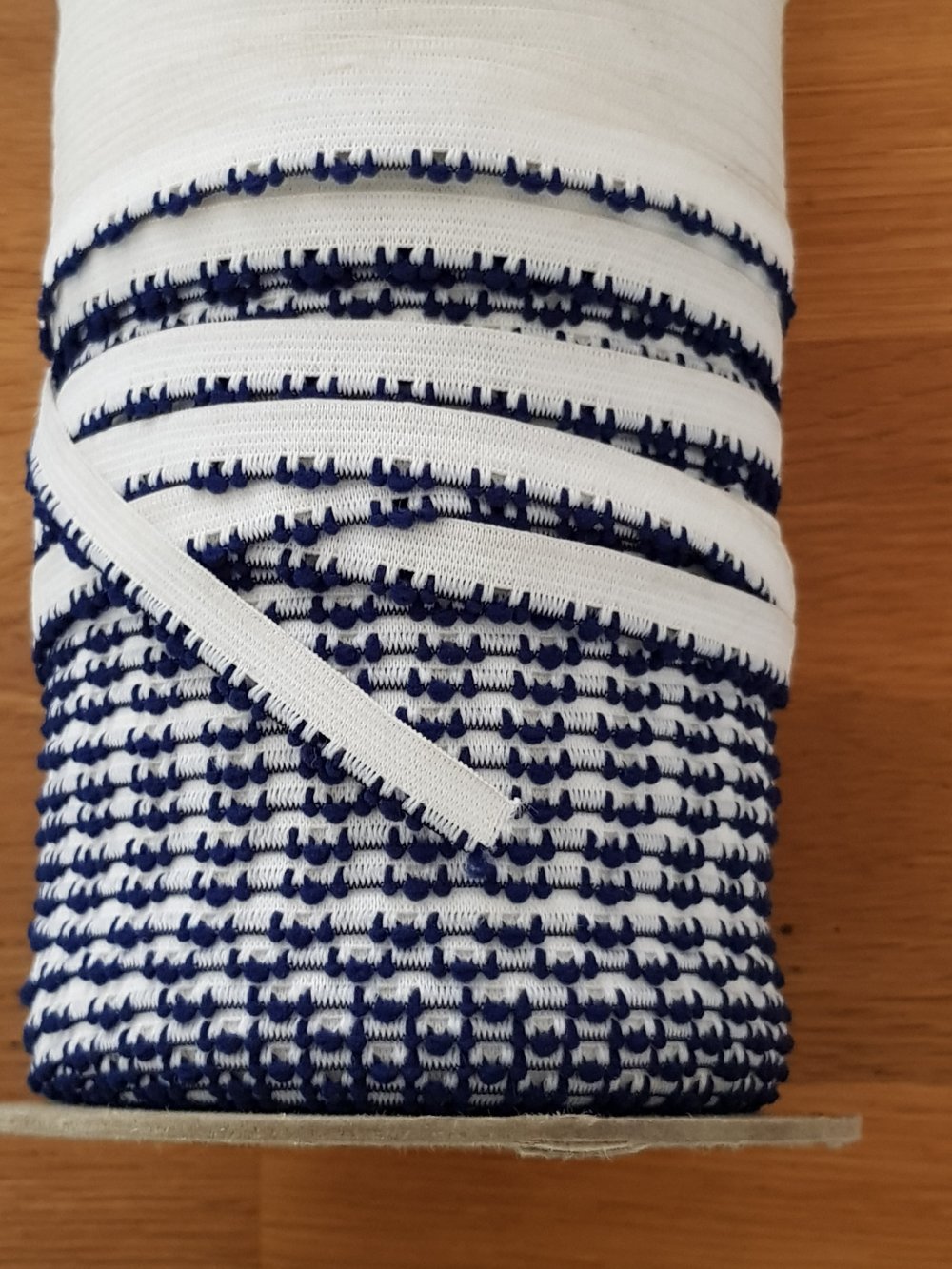 Meterware Elastisches Gummiband wei&szlig; Phantasie 9 mm.