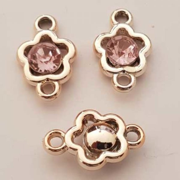 Pendentif en plastique et strass acrylique fleur entre deux N&deg;02 rose