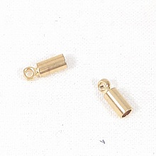 Apprêts bijoux: 2 embouts dorés cordon rond 2mm