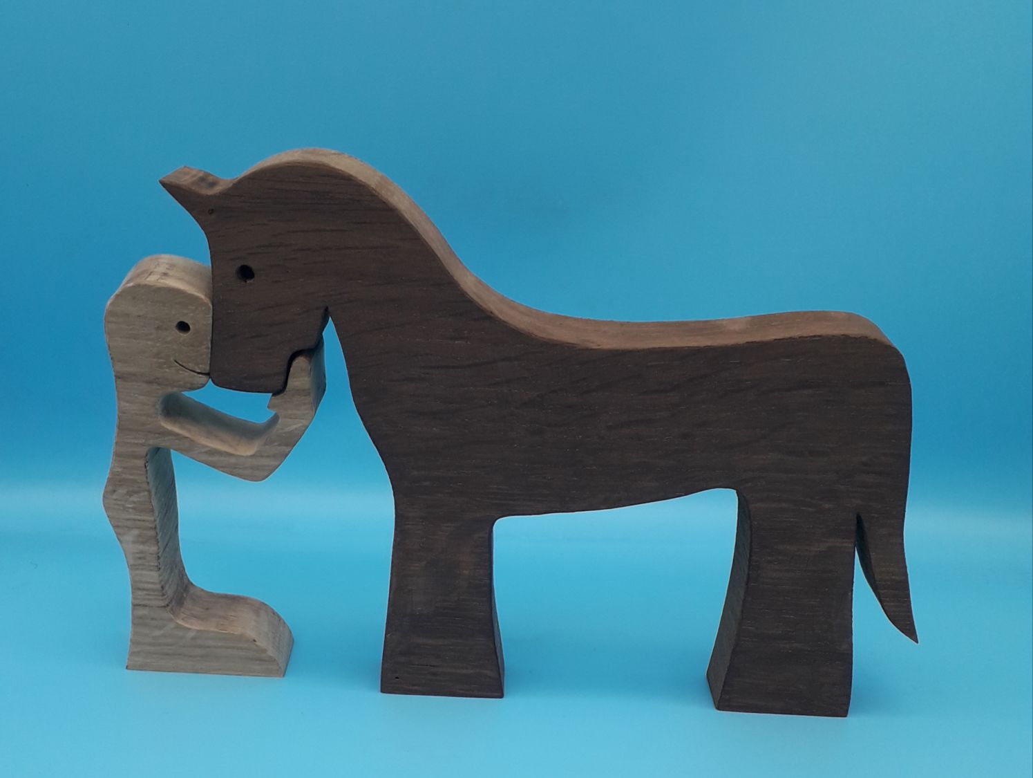 Figurine Mann und sein Pferd aus Holz