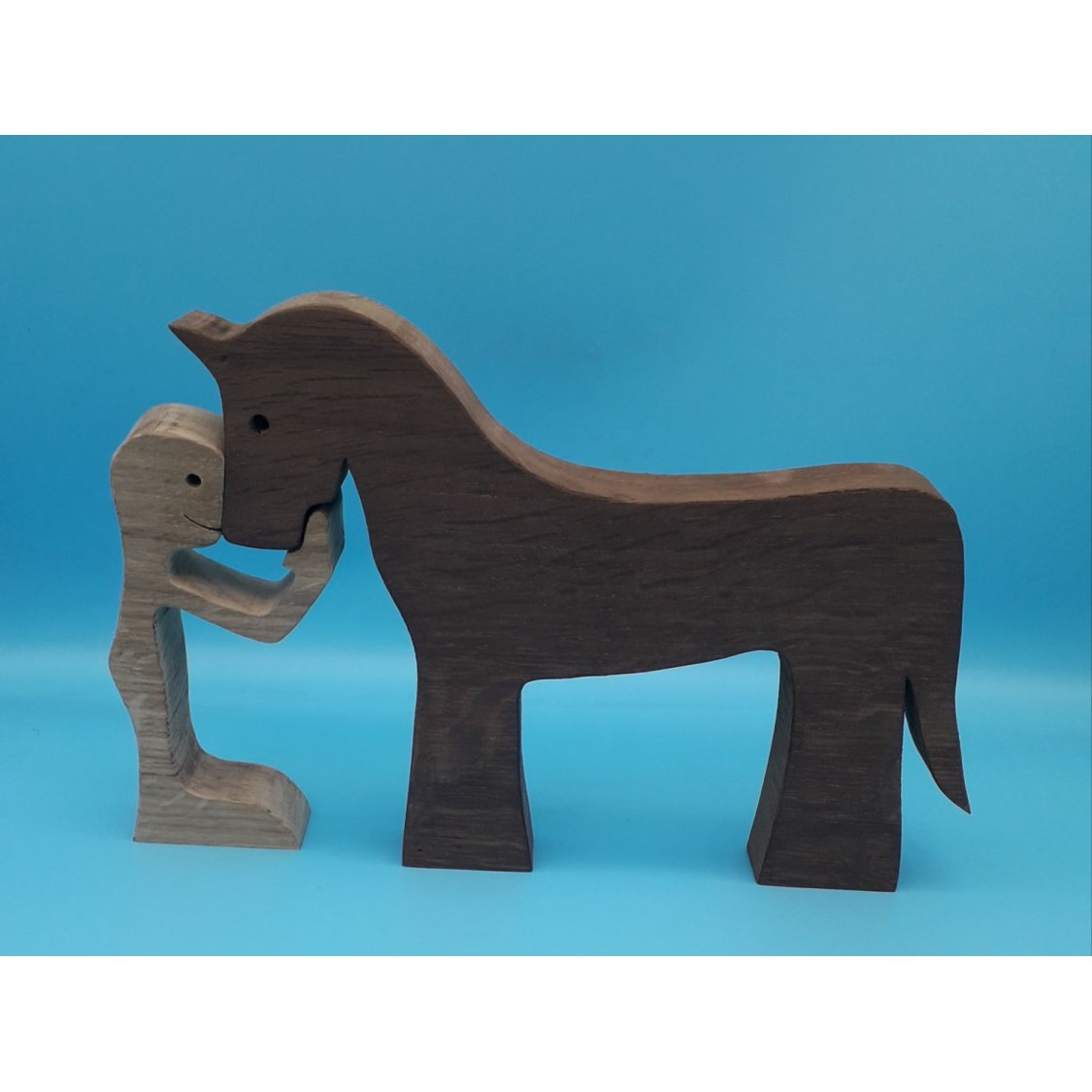 Figurine Mann und sein Pferd aus Holz