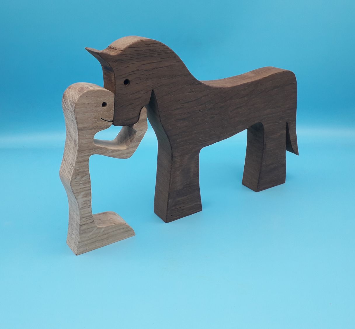 Figurine Mann und sein Pferd aus Holz