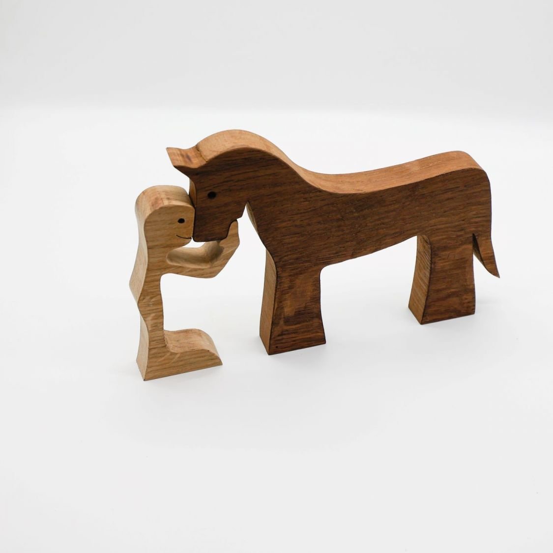 Figurine Mann und sein Pferd aus Holz