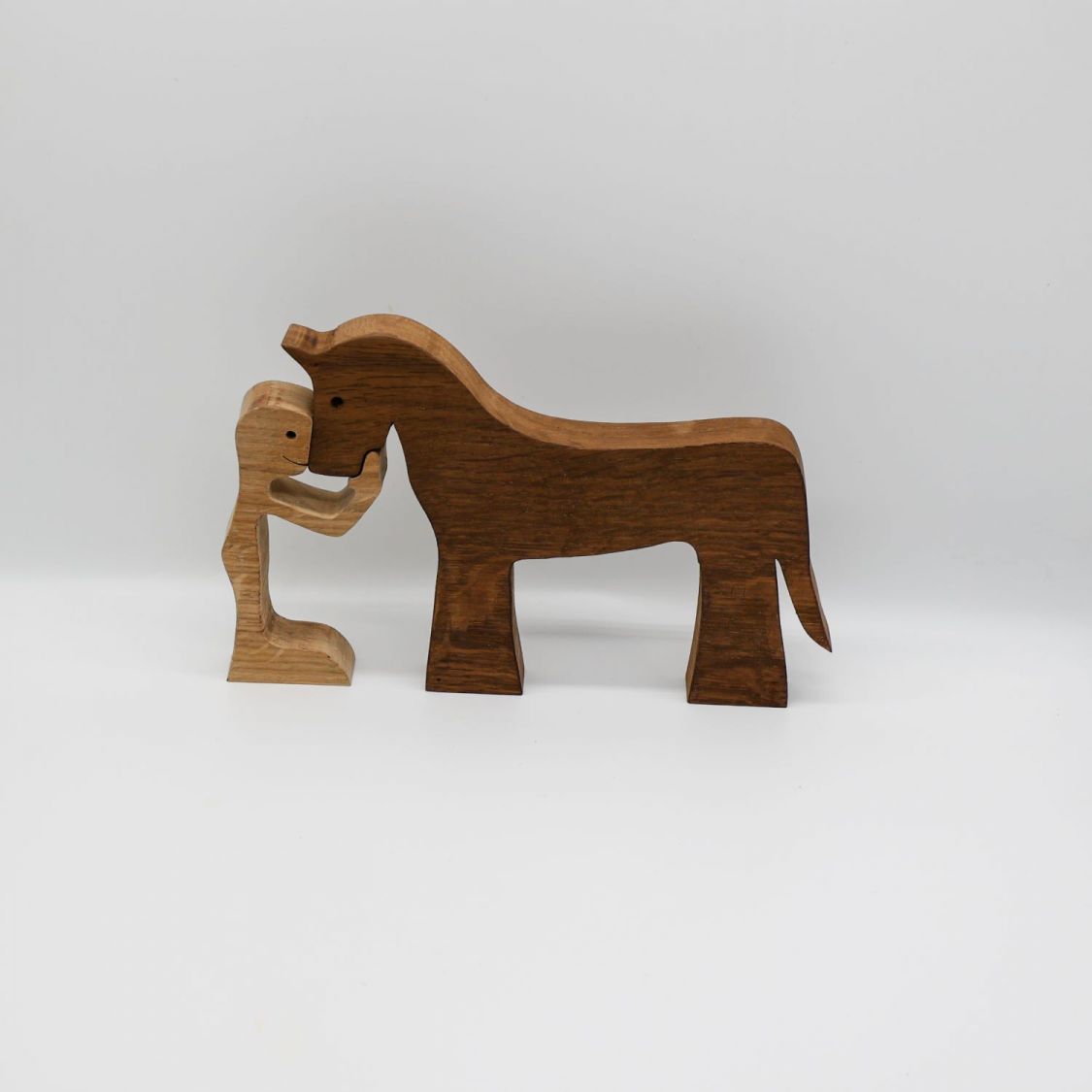 Figurine Mann und sein Pferd aus Holz