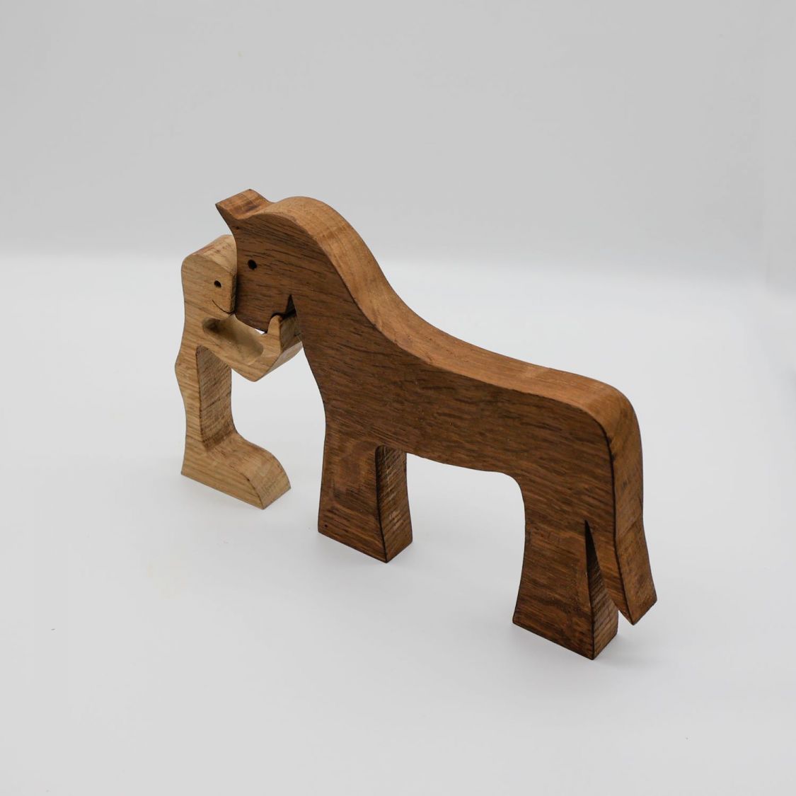 Figurine Mann und sein Pferd aus Holz