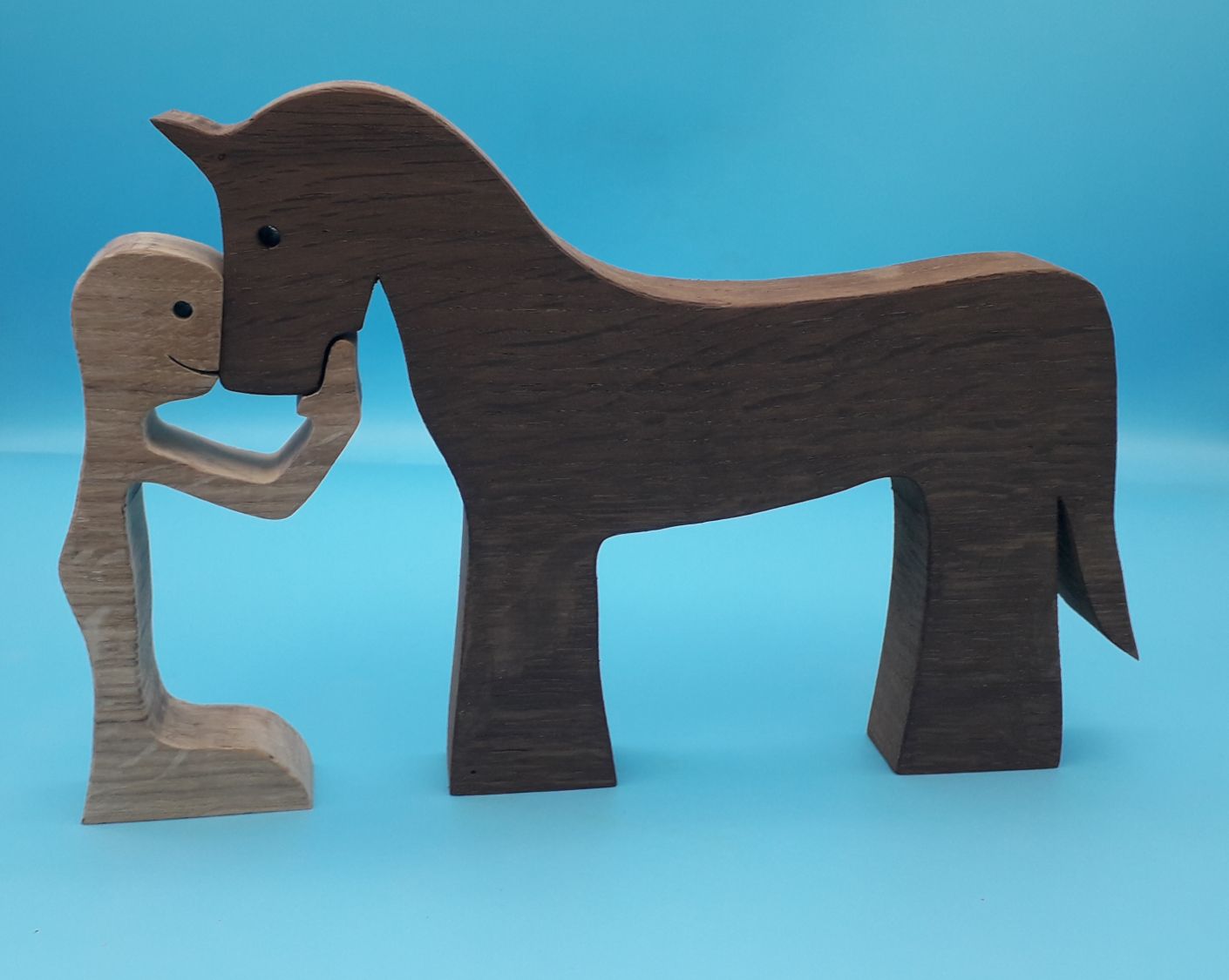 Figurine Mann und sein Pferd aus Holz