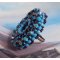 Bestickter Naïade Ring mit einem Cabochon in türkisblauem Harz und Kristall, ein schönes Lichtspiel.