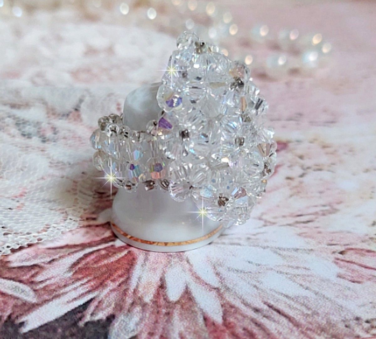 Ring Flocken mit Facetten und Kreiseln aus Swarovski-Kristall