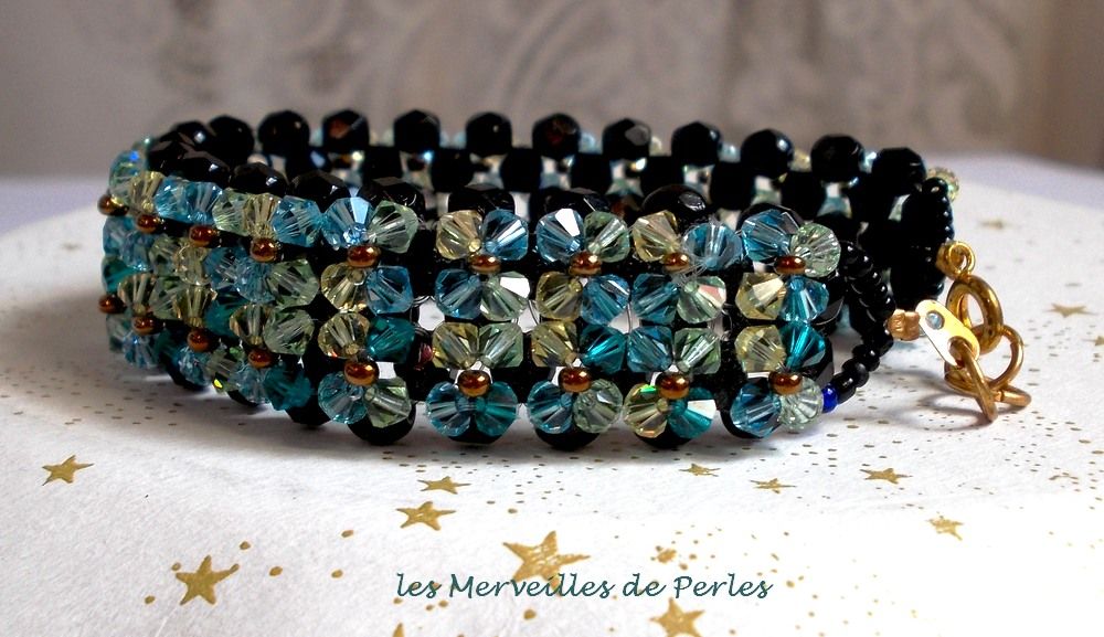 Aurora Sparkling Armband mit schwarzen Facetten und farbigen Kreiseln in Swarovski-Kristall.