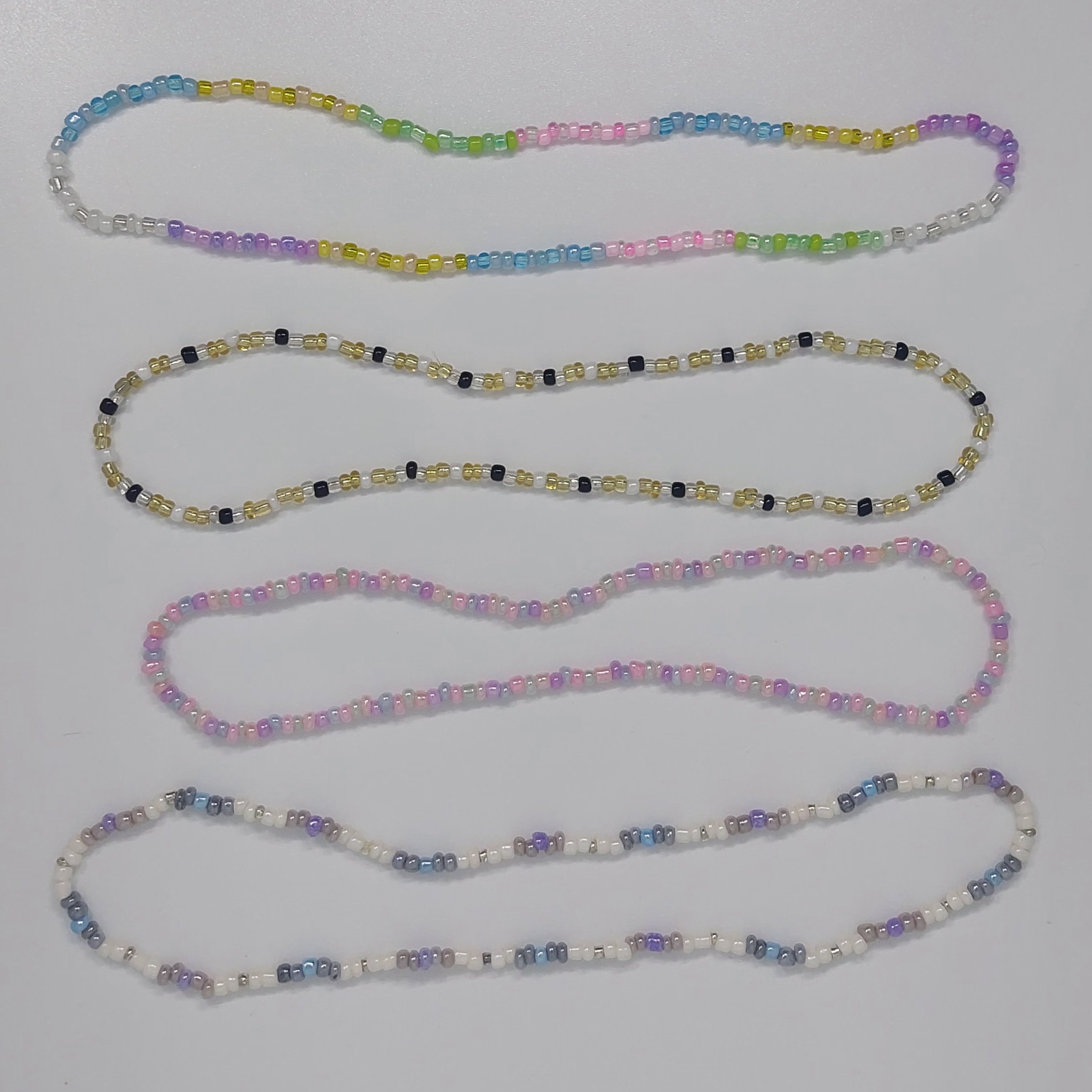 Ras du cou sir&egrave;ne en perles pastel